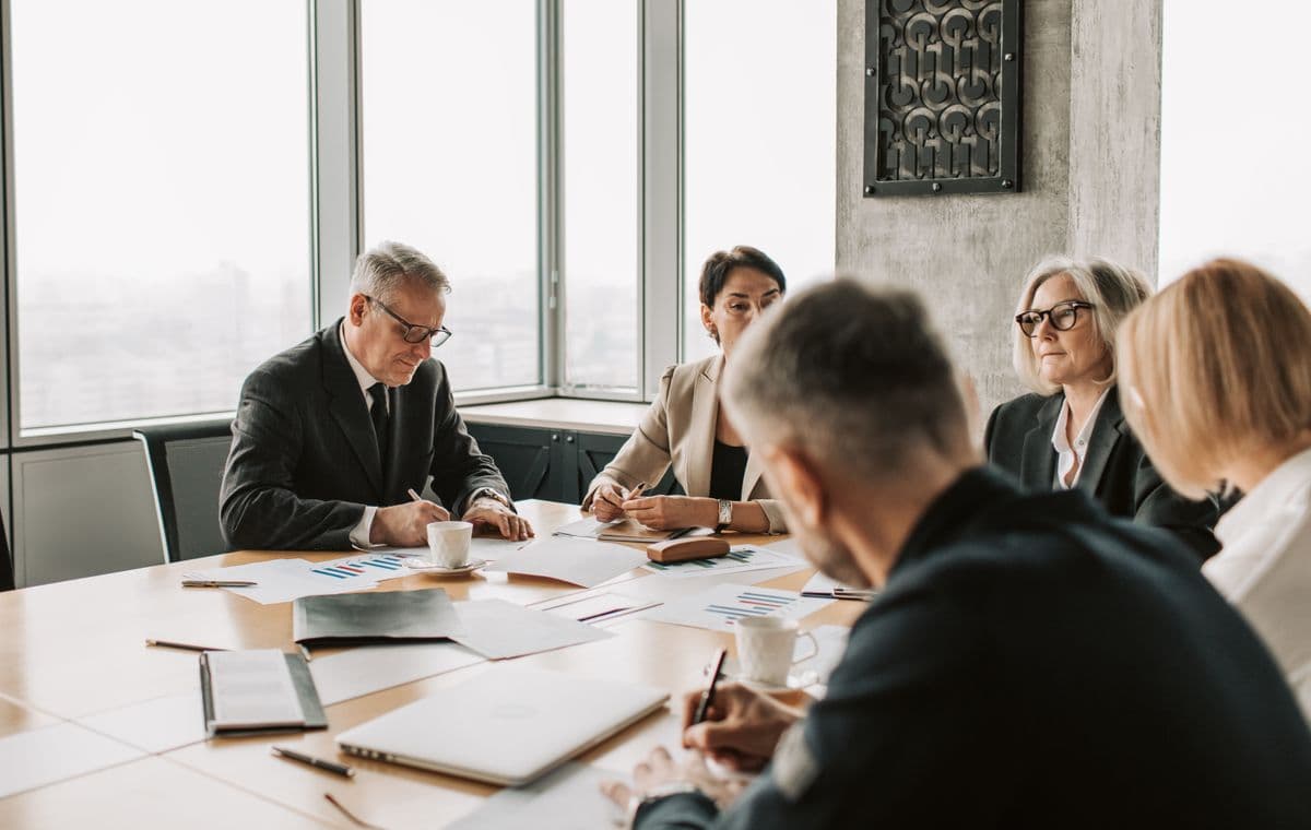 Corporate boardroom with people in a meeting