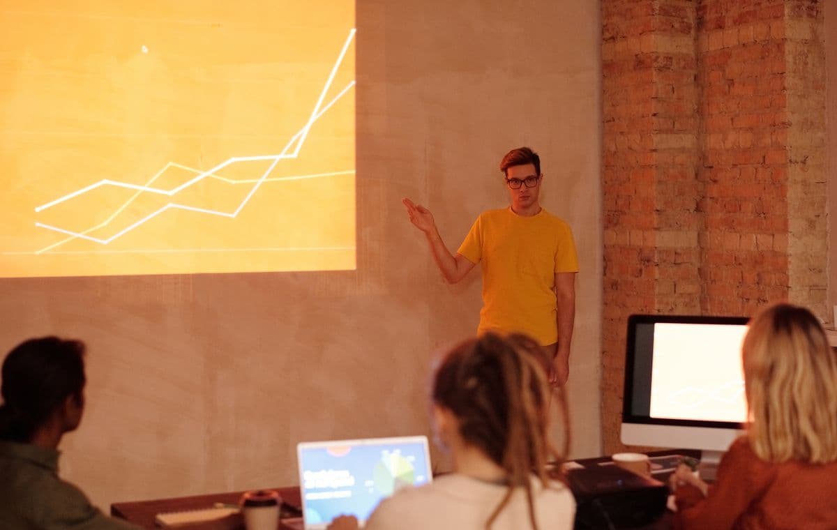 Reputation specialists reviewing analytics together in an office